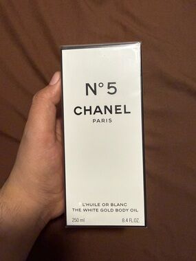 CHANEL Shimmering Fragranced Body Oil — White Packaging with Black Text